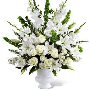 This stately design features fresh roses