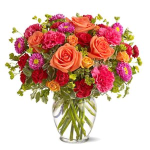 This upgraded version of our colorful How Sweet It Is Bouquet includes more flowers for a larger