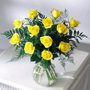 Brighten someone's day with this thoughtful bouquet of one dozen yellow roses