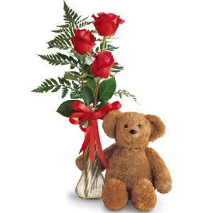 Warm someone's heart with this sure-fire combination of three red roses in a bud vase and an adorable teddy bear