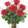 fresh from the farm roses arranged in a glass vase with foliage and tasteful accents. When ordering