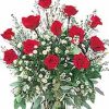 long-stem beauties arranged with foliage and babies' breath or similar accent flowers. When ordering