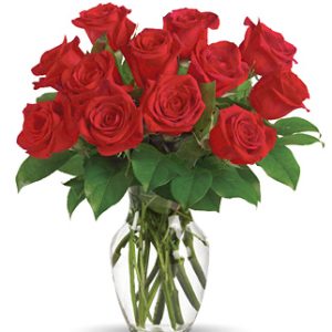 Say 'I Love You' one dozen times with twelve premium roses designed and delivered in a tasteful glass vase. An embrace of beauty! Simply indicate your color preference below. Florist delivery in the USA and Canada.