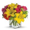 Send a sunny splash of color with this contemporary compact bouquet of lilies