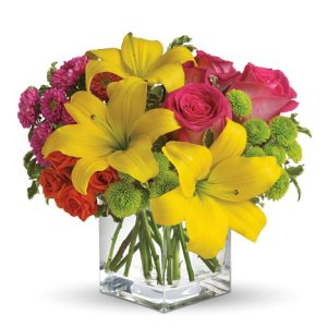 Send a sunny splash of color with this contemporary compact bouquet of lilies