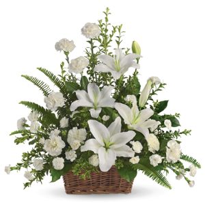 Send your sympathy and support with this thoughtful basket bouquet of white lilies