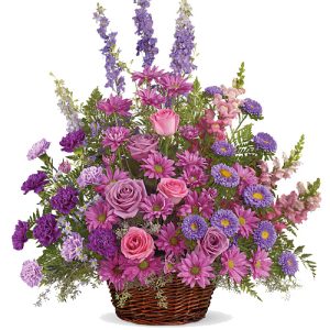 This lovely sympathy flowers basket features a soothing combination of seasonal fresh flowers