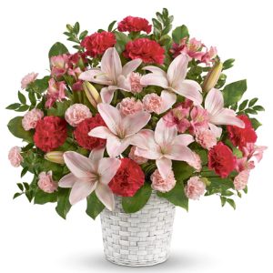 Express your deepest sympathy with this lovely display of fresh lilies