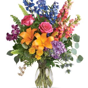Send a summer garden of blooms with this colorful bouquet featuring hydrangea