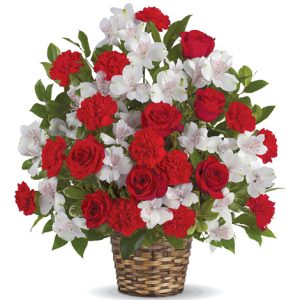 Express your sympathy and show how much you care with this stately red and white floral tribute featuring roses