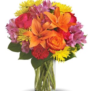 Send smiles across miles for any summer or Autumn occasion with this cheery combination of fresh seasonal blooms in a welcome array of colors. Featured flowers include roses