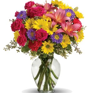 Send your warmest wishes or congratulations with this colorful mixed bouquet of seasonal fresh blooms in cheery yellow