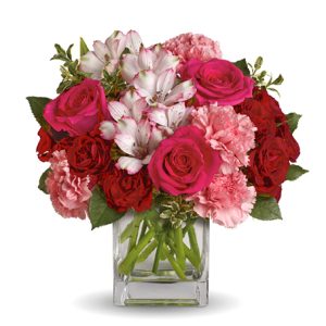 Send a message of love with this can't miss combination of fresh roses