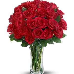 Show how much you care with two dozen gorgeous long-stem roses arranged with fresh foliage in a tasteful glass vase. Spectacular! Available in most areas in your choice of color. Florist delivery in the USA and Canada.
