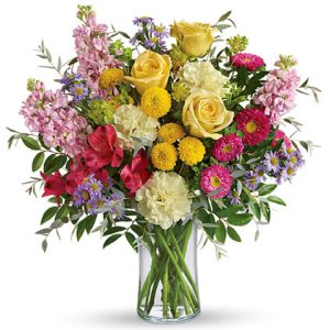 Send smiles across miles with this delightful bouquet of cheerful yellow