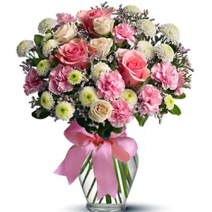 A pretty pink and white bouquet featuring roses
