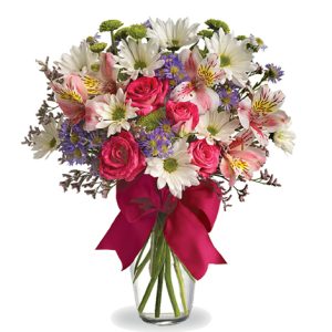 A pretty little pastel vased bouquet featuring daisy spray chrysanthemums