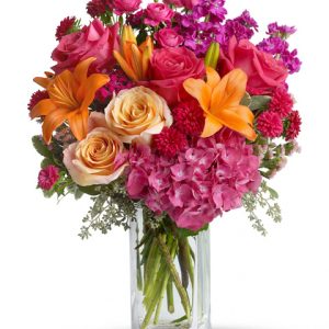 Send an exceptional assortment of tones and textures with this fancy vased bouquet featuring roses