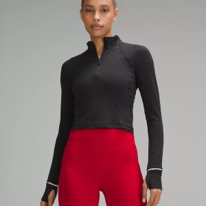 Why we made this. Cold out? Don't miss a run with this warm half zip.. Fabric. Soft and Warm