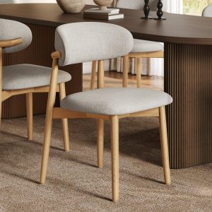 Add comfort & style to your dining space! This elegant wood dining chair features an ash frame