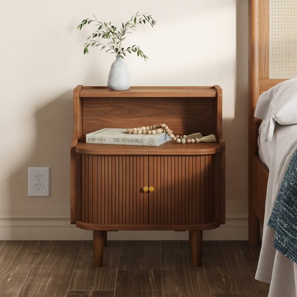 and it rests on four sleek angled legs that emulate the iconic style. color:Brown