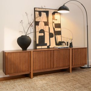featuring an ash wood door & solid wood legs. The natural grain of the media console adds timeless elegance