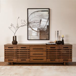 featuring an elegant elm veneer finish. This media console includes cable management holes for a tidy setup