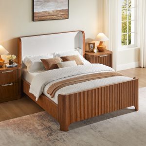 a beautifully handcrafted piece made from solid oak with refined vertical slat detailing that brings texture and architectural elegance. The softly curved headboard is upholstered in plush