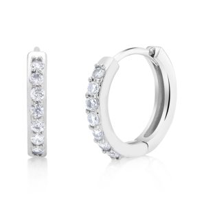 This pair of classy gold plated cubic zirconia huggie earrings features round brilliant cut cubic zirconia stones. The gold plating prevents tarnishing. Secure locking clasp prevents the hinges from opening while wearing. Let your style shine!* 18kt Gold Plated* Cubic Zirconia Stones* 12mm size* Comfort fit* Choice of white