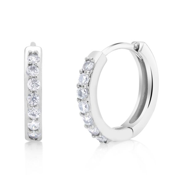This pair of classy gold plated cubic zirconia huggie earrings features round brilliant cut cubic zirconia stones. The gold plating prevents tarnishing. Secure locking clasp prevents the hinges from opening while wearing. Let your style shine!* 18kt Gold Plated* Cubic Zirconia Stones* 12mm size* Comfort fit* Choice of white