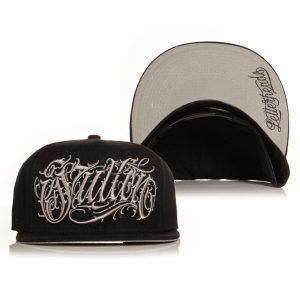 <p>Letterheads is BACK and with El Pichi Letras Hat kicking things off! This black snapback hat features puff embroidery Sullen logo in grey