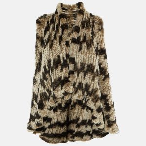 This cream vest from Alice + Olivia is meticulously crafted using rabbit fur in a relaxed open front design. The easy silhouette layers beautifully over knits or dresses