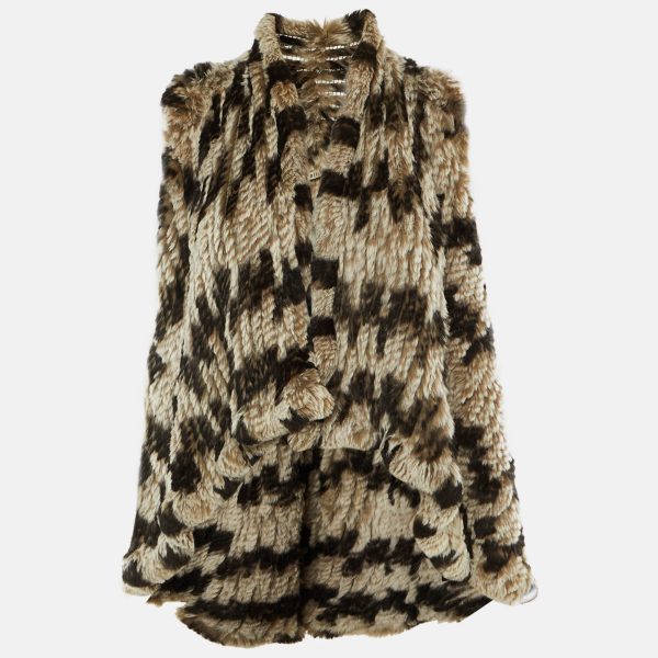 This cream vest from Alice + Olivia is meticulously crafted using rabbit fur in a relaxed open front design. The easy silhouette layers beautifully over knits or dresses