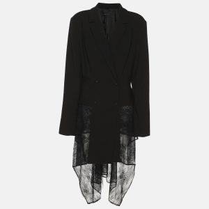 BCBGMAXAZRIA reimagines tailoring through texture. This double breasted blazer in black crepe is trimmed with a lace hem