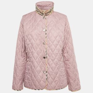 This Burberry Brit jacket brings cozy comfort with its quilted design and rich mauve hue. Lightweight yet insulating