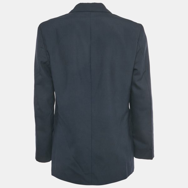 this Burberry double breasted blazer exudes timeless British sophistication. The structured fit offers polished versatility for work or weekend. A true wardrobe investment.