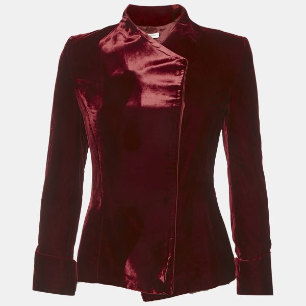 Carolina Herrera’s jacket is cut from plush red velvet in a flattering cross over design. Bold yet sophisticated