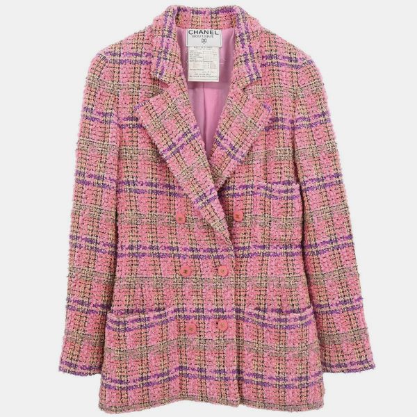 Chanel’s double breasted jacket in pink tweed is a statement of timeless elegance. Structured yet feminine