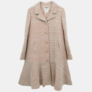 This Chanel coat embodies the quiet power of pink — not sweet