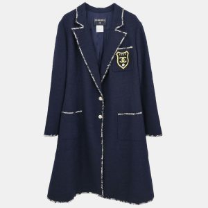 With its deep navy tone and sculptural silhouette
