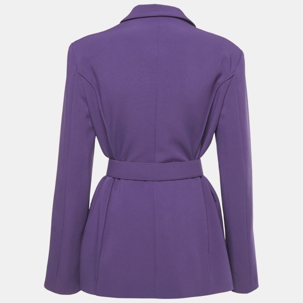 it’s designed to cinch the waist and sculpt the figure with effortless finesse. Gold tone accents and tailored seams echo the brand’s glamorous Italian sensibility—perfect for pairing with slim trousers or pencil skirts for an empowering finish.