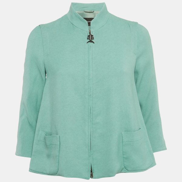 Emporio Armani’s zip up jacket in mint green crepe combines tailored lines with soft texture. A versatile layer