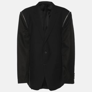 Givenchy reimagines classic tailoring with edgy zip accents on this black wool and nylon blazer. Designed in an oversized fit