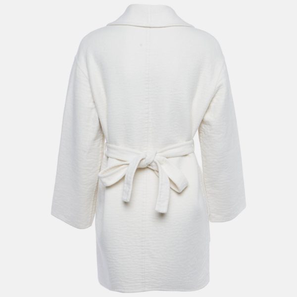 wrapping across the body in a mid length silhouette. Minimal yet luxurious