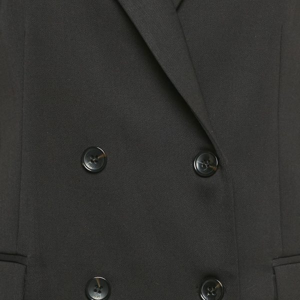 making it a versatile piece that bridges modern tailoring and everyday sophistication.