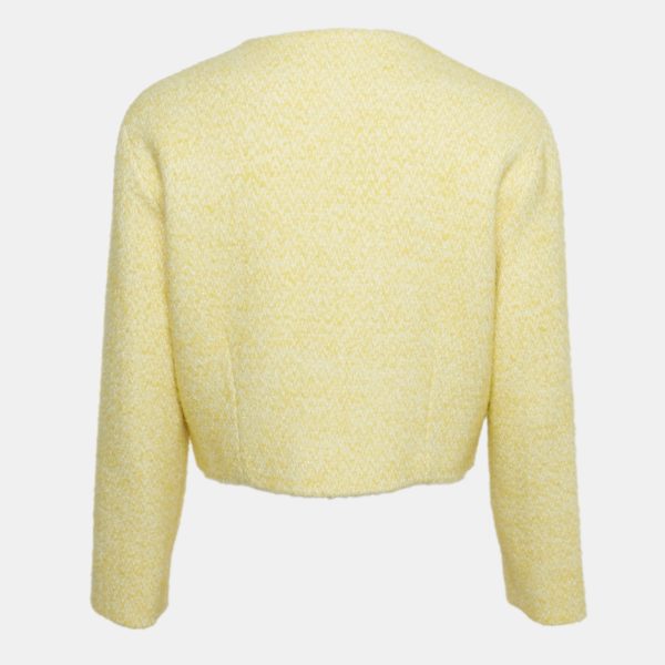 bringing a contemporary twist to tailoring. Structured yet playful