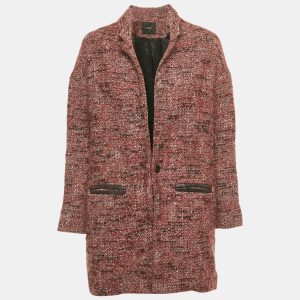 Maje’s Gordan coat is crafted in red tweed with leather trims on its pockets. The mid length cut offers coverage while maintaining movement