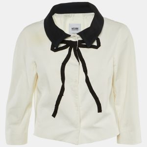 Add a playful twist to your wardrobe with this Moschino Cheap and Chic cotton jacket in white and black. Featuring charming bow detailing and tailored structure
