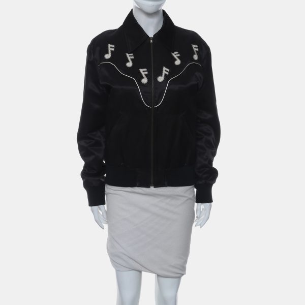 creating a bold visual symphony in motion. Equal parts playful and polished