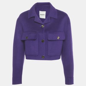 Sandro’s cropped jacket is tailored from purple wool with clean seams and discreet pockets. The vivid tone updates a timeless cut. It’s a compact piece that stands out without fuss.